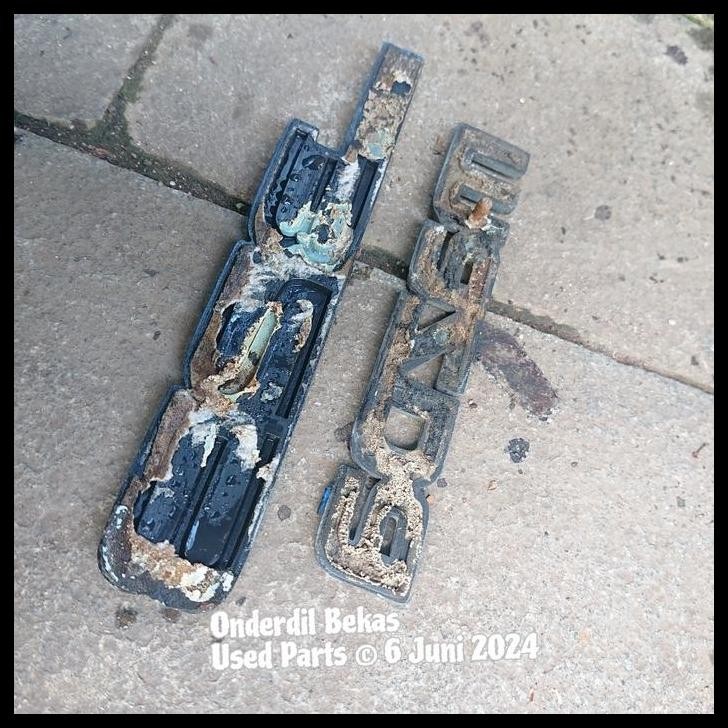 DISKON EMBLEM BAGASI MAZDA 323 ELITE 