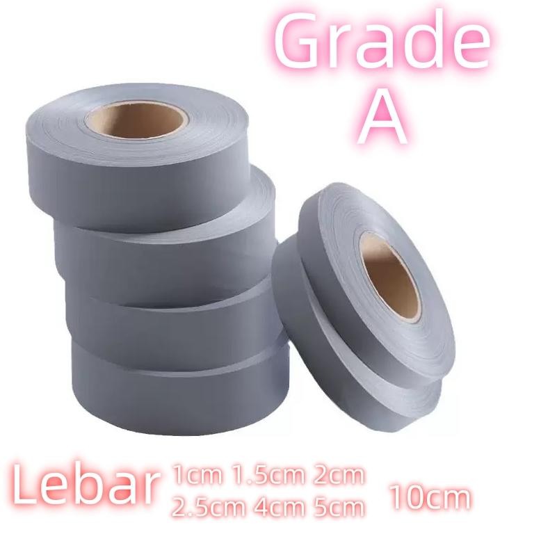 

Pita Scotlight Scotlite Skotlet Kain / Pita Reflective Kain Grade A Abu-Abu Lebar 2.5cm 5cm 200mtr/roll aSt