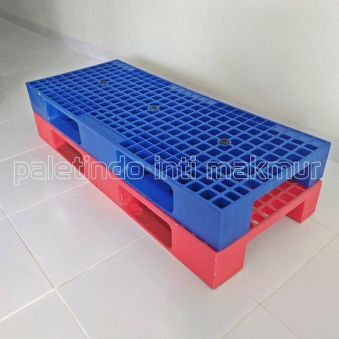 

Palet Plastik Medium Duty 120 X 50 X 13,2 Cm - Berlubang Ready Warna Biru & Merah
