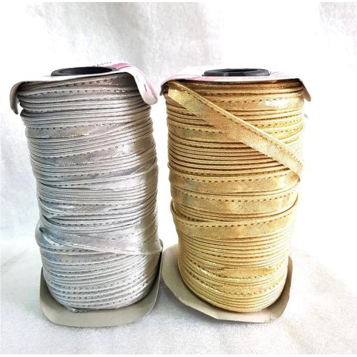 

Bisban Isi / Satin Bias Tape / Lis Baju Per 1 Rol @90 Yard Warna Emas & Silver Tali List