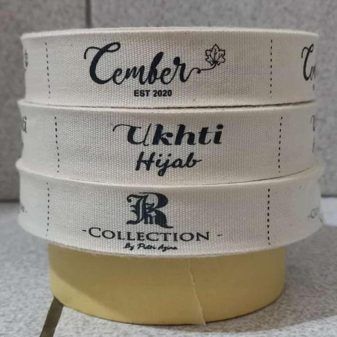 

Premium Cetak label pita katun krem 2cm utk hijab dll ( free desig)