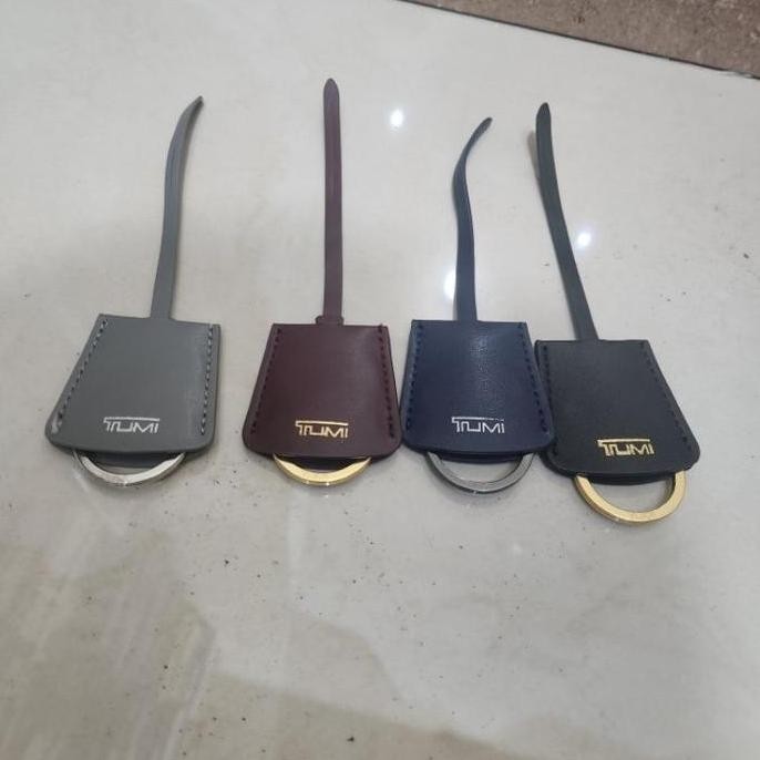 

Accesories T U M I Name Tag Wanita