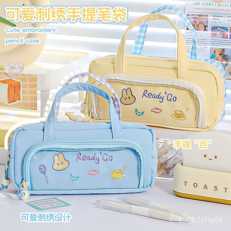 

Large Capacity ins Lucky Star Embroidered Pencil Case Handheld Color Block Design Plaid High-Value Niche Stationery Bag FOU3