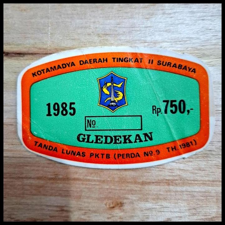 

BEST DEAL KOLEKSI JADUL / VINTAGE. PAJAK GLEDEKAN (LABEL STIKER) KOTAMADYA DAERAH TINGKAT II SURABAYA 1985 RP 750,- TANDA LUNAS PKTB ( PERDA NO. 9 TAHUN 1981) !!!!