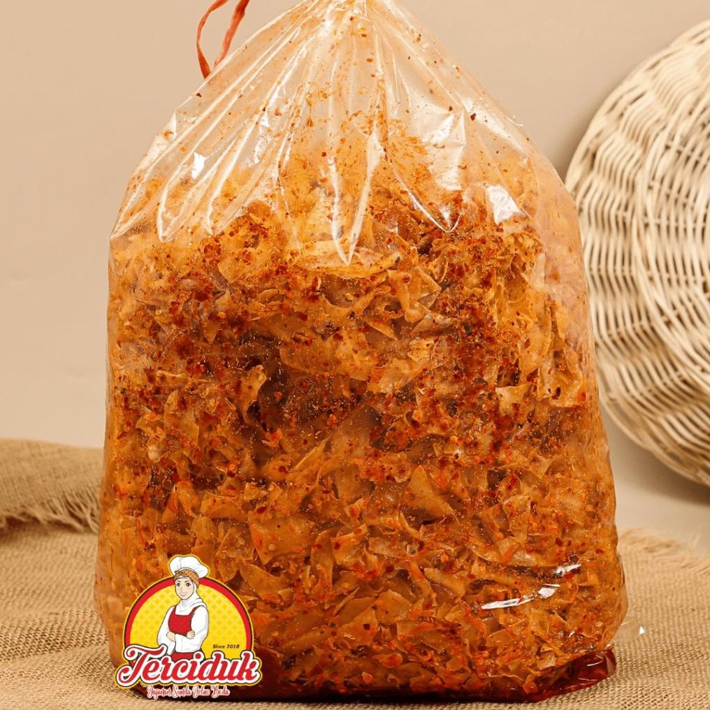 

TERCIDUK - KERIPIK SINGKONG KRIWIL BUMBU BASAH PEDAS DAUN JERUK KEMASAN 500G Nugi