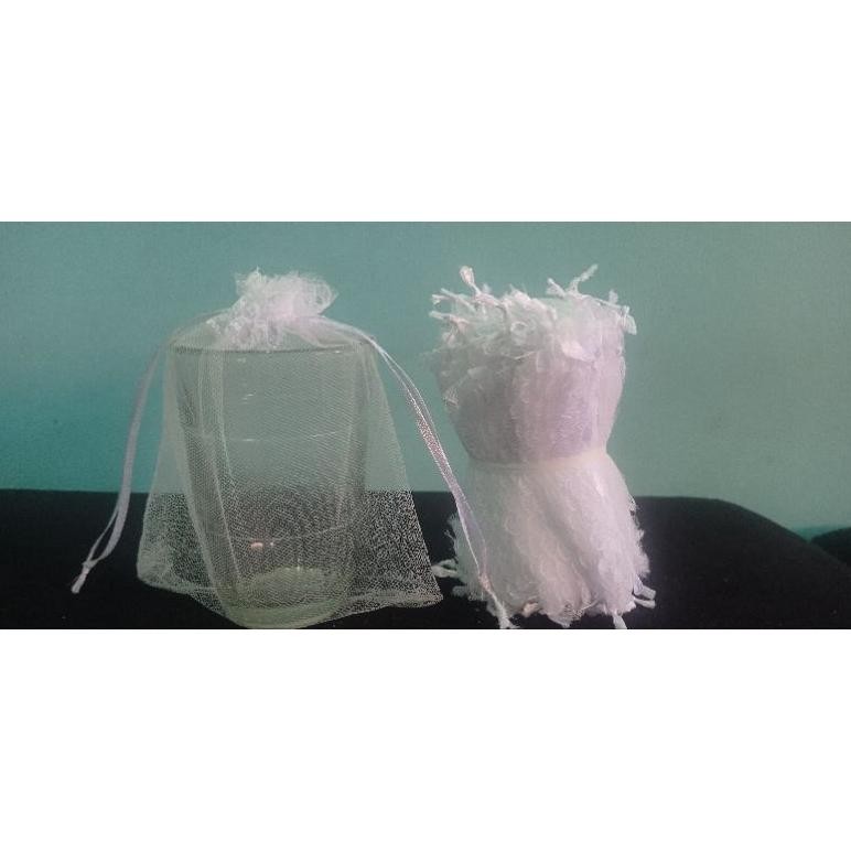 

(isi 50 pcs)Sarung tile untuk Souvenir Size/11 x 16cm Nugi