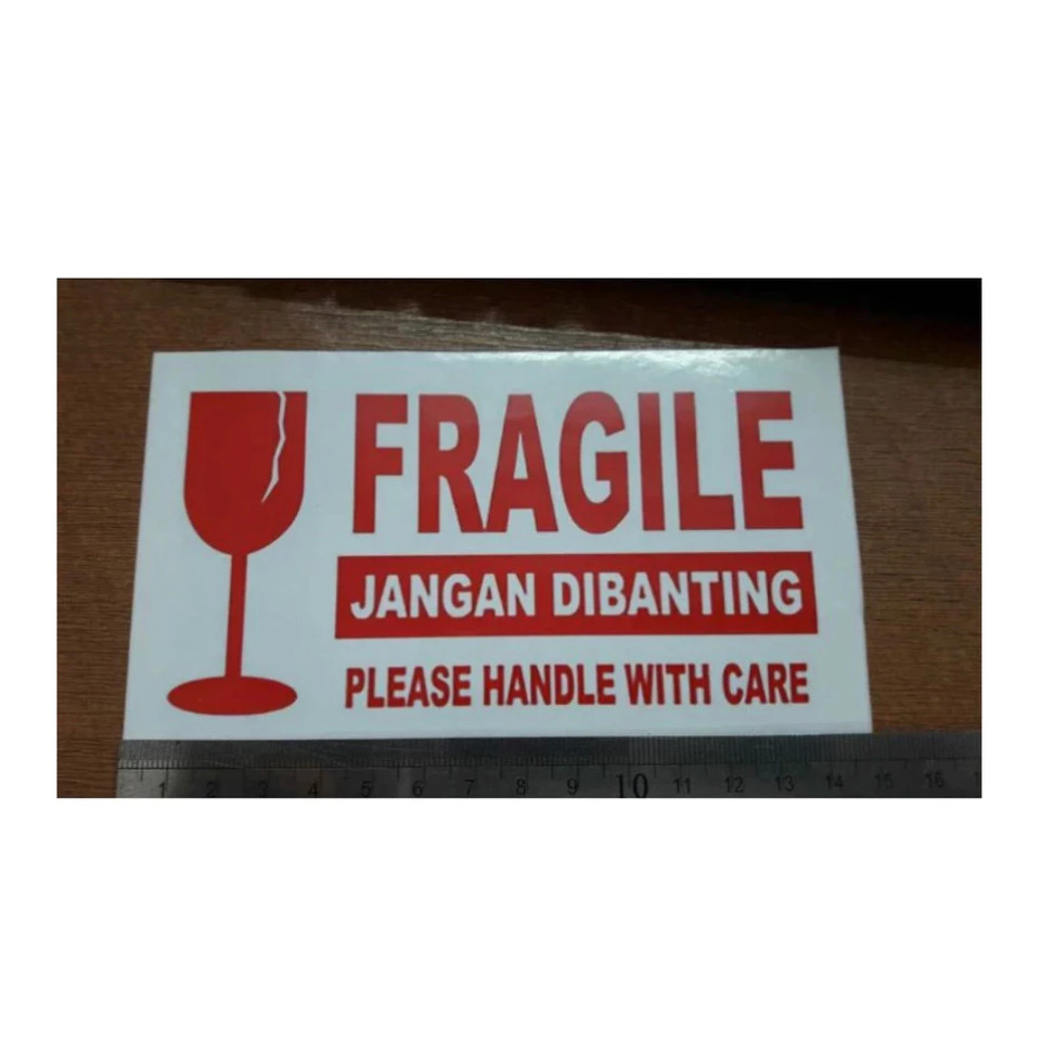

STIKER FRAGILE PUTIH JAMAN NOW MERAH PUTIH PECAH BELAH STICKER FW
