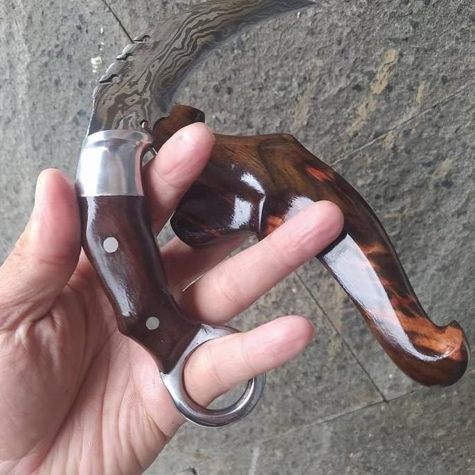 

Pisau Kerambit Silat Baja Pamor Damaskus Balik Mipih Dural