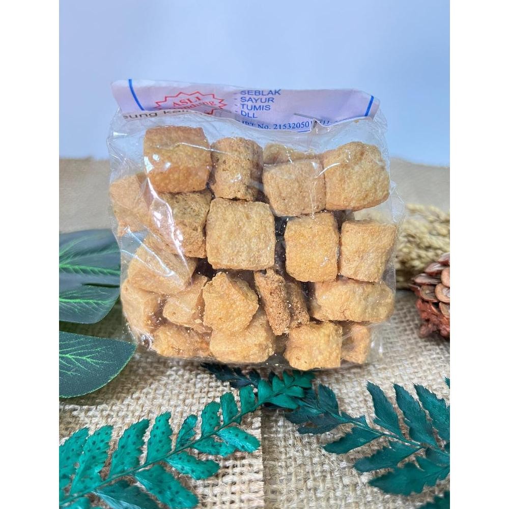 

Tahu Dadu Kotak Kering mini 1 pak 10 bungkus Nugi