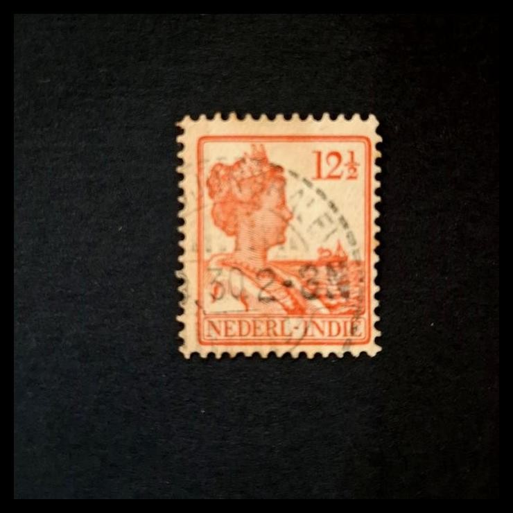 

TERMURAH PRANGKO NED INDIE 1930. RATU WILHELMINA 12 CENT DENGAN LANGEBALKATEMPEL/ LONG BAR CANCELLATION, TANJONGBALEI !!!!!!