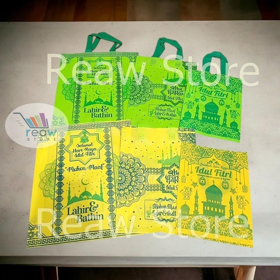 

ed-7 dgf-4 Per Lusin 12Pcs Goodie Bag Spunbond Kantong Souvenir IdulFitriLebaran Murah Original