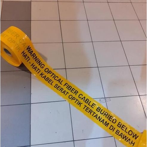

new !!! warning tape optical fiber cable buried below - pita pembatas