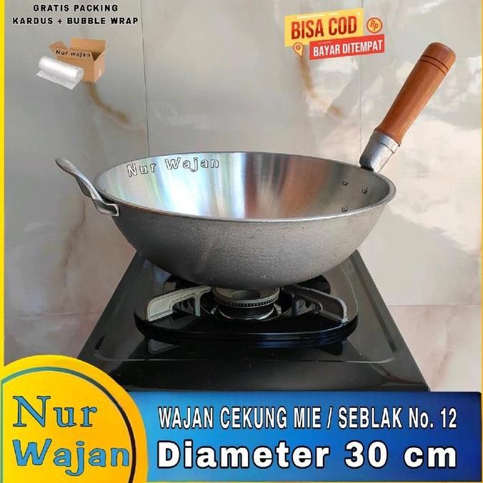 

Wajan Bakmie / seblak no 12 / Wajan nasi goreng Alumunium Tebal anti lengket Anti karat Kitchenware ( Micek 12 )