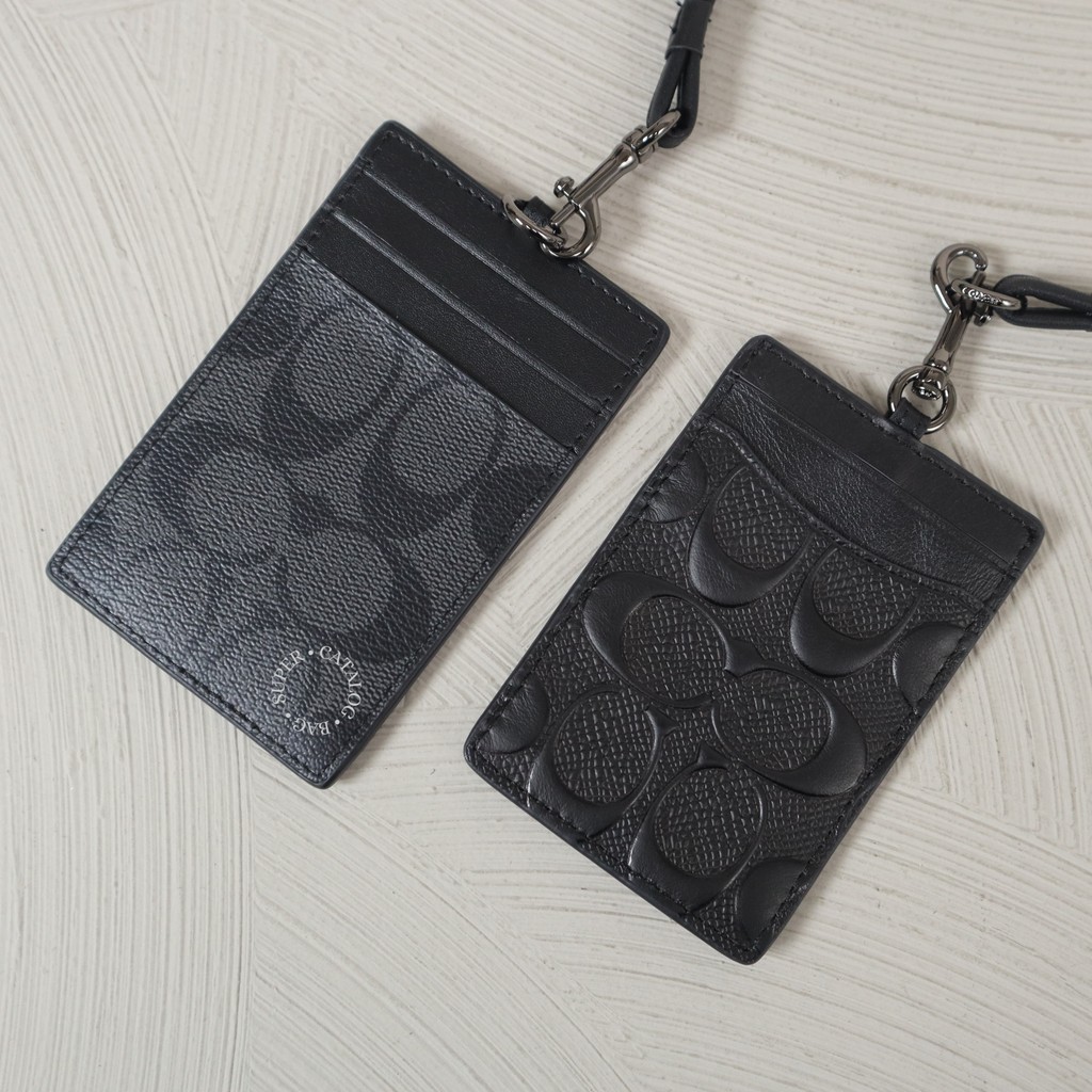 

Lanyard ID Card Wanita / Pria Emboss Hitam & Signature Hitam Strap Leather