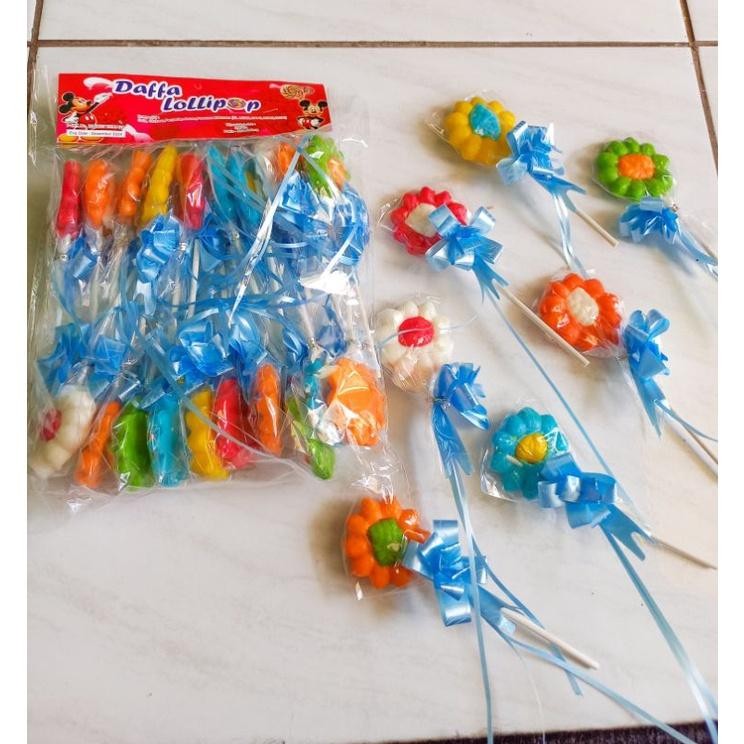 

Lm Lolli Matahari Pita Premium Isi 20Pcs By Daffa Lollipop