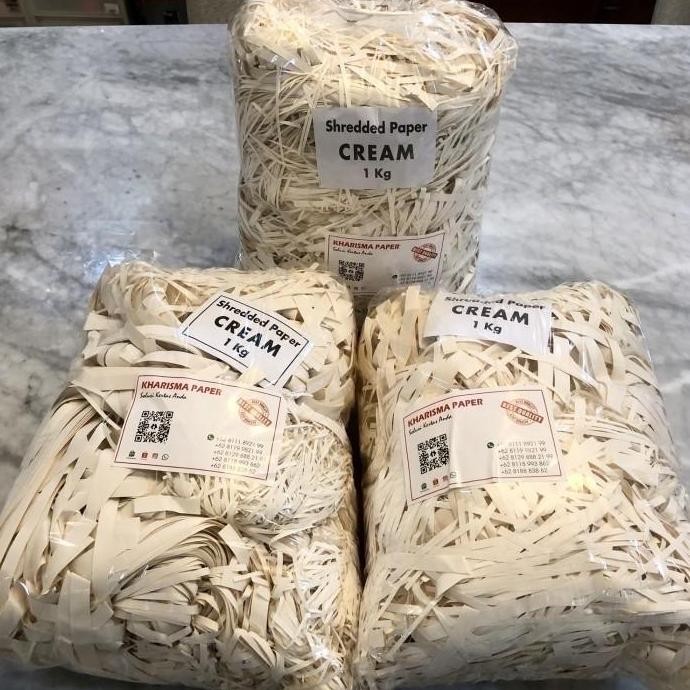 

new !!! Shredded paper CREAM / kertas serut/cacah @ 1 kg, bahan Book Paper