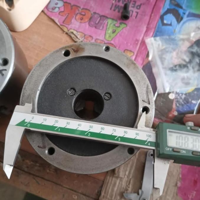 Flange adapter Clow mesin bubut
