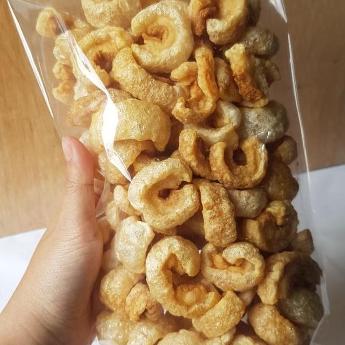 

kerupuk babi/krubi/kerupuk kulit babi samcan opig 250gr Cemilan Snack Pedas Asin Krupuk Rambak Food CS