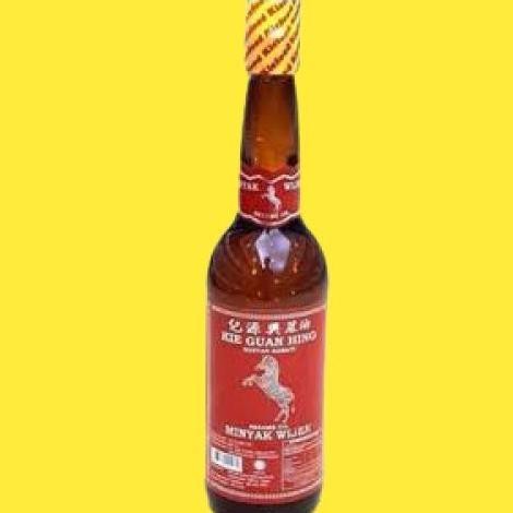 

Minyak wijen cap Kuda Zebra Kie Guan Hing sesame oil 600ml - Halal