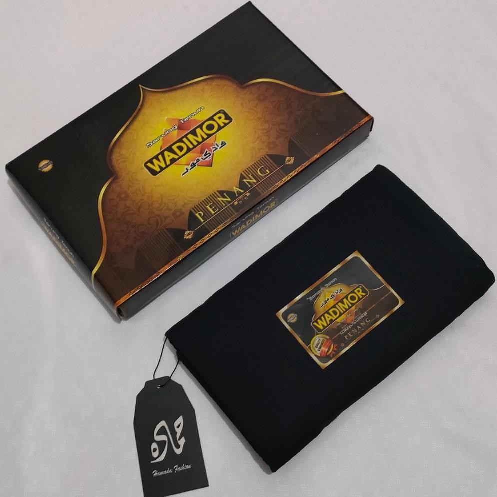 Hj-54 Sarung Tenun Wadimor Polos Hitam - Putih Hj-54