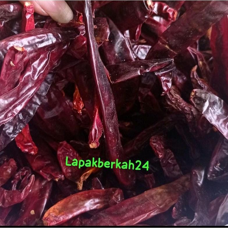 

Revolusioner ( 1.Kg ) Cabe Merah Besar Kering Super Tanpa Tangkai Tidak Pedas