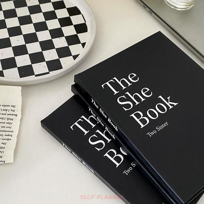 

She Black Hardcover Notebook Co