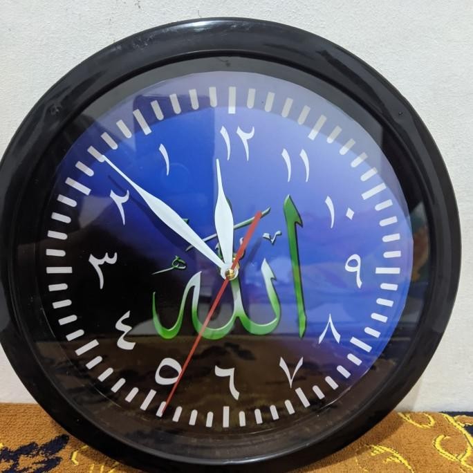 Jam dinding tawaf unik arah putaran dari kanan ke kiri H85S
