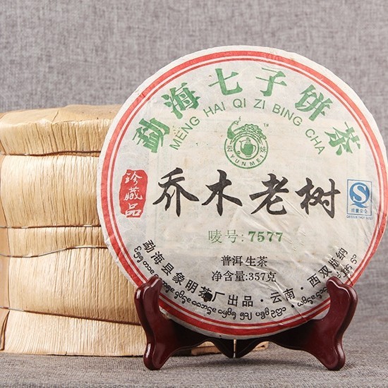 

Pu erh Tea 7577 QIAO MU lao shu 2008 Old Year Qi Zi Bing