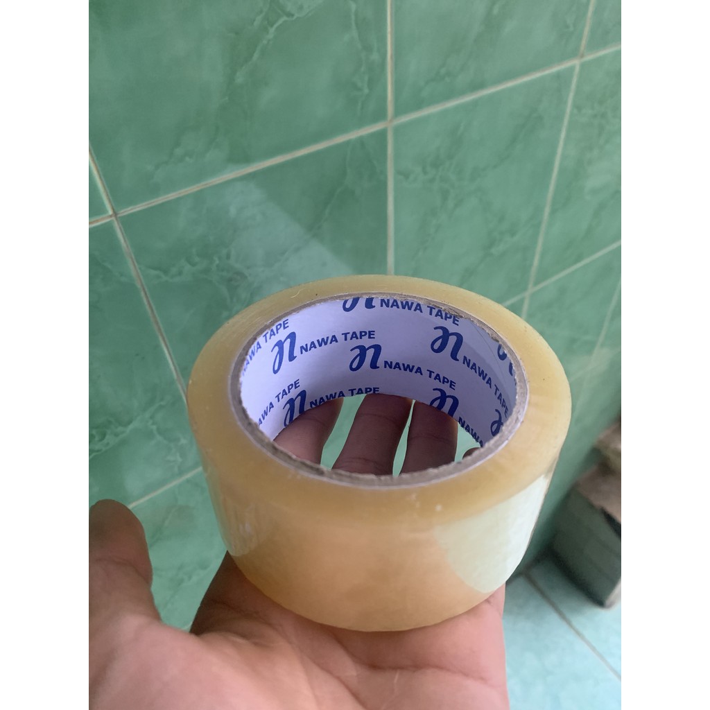 

Bisa COD - Lakban Putih Nawa Ukuran Sedang Bening Tape Perekat Kuat Kualitas Tinggi Segera