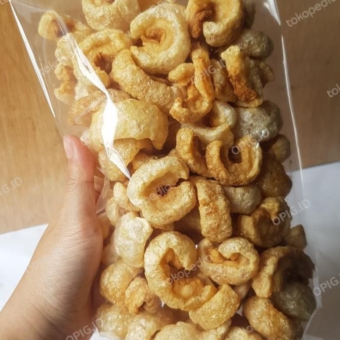 

kerupuk kulit babi/krubi/kerupuk kulit babi samcan opig 250gr H85S