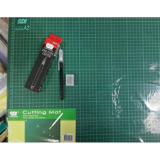 

Termurah PAKET CUTTING MAT SDI A2 + PEN CUTTER + REFILL