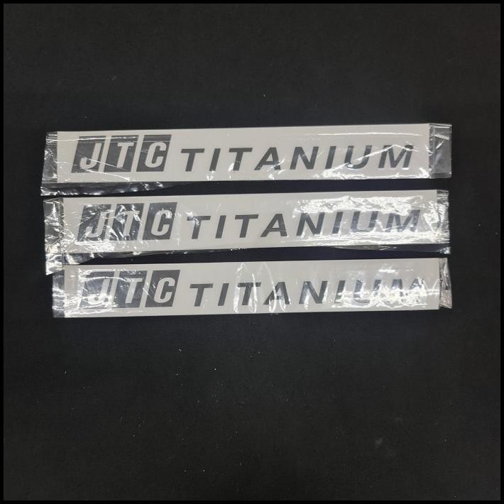 

TERMURAH JTC TITANIUM STIKER HITAM PUTIH 27CMX 3,7CM !