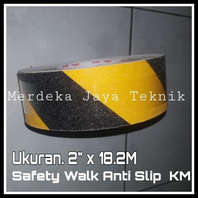 

LAKBAN LANTAI KM YELLOW-BLCAK ANTI SLIP KM SAFETY WALK KM 2" X 18.2M ASLI