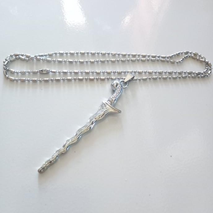 ~~~] kalung pria titanium keris kuning sakti mandraguna