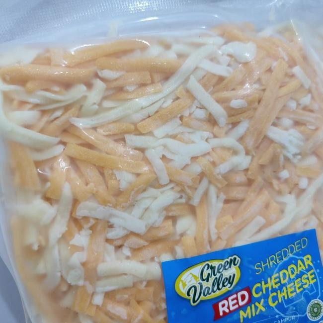 

Green Valley Red Cheddar Mozzarella Cheee Eju Parut 1G Halal