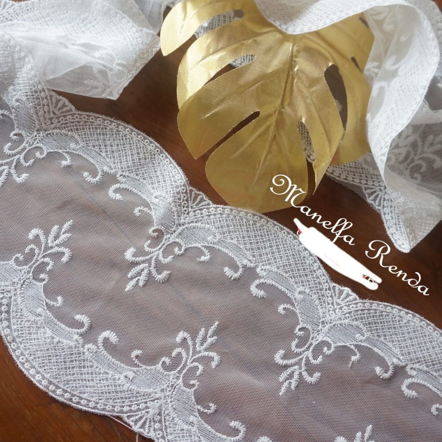 renda tile warna bw dan warna warni, lebar 15cm - 20cm, harga per 15y.