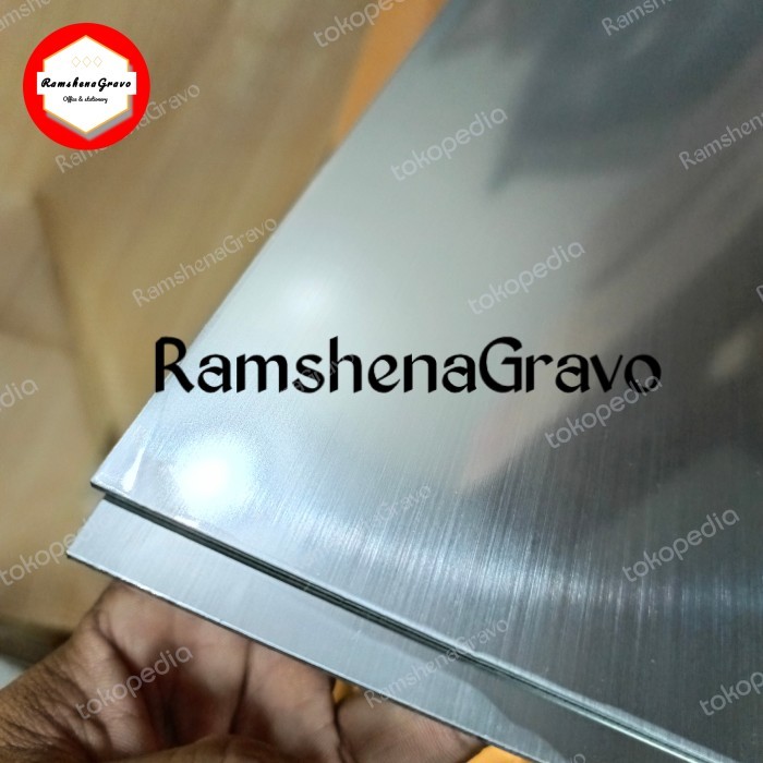 

gravoply/bahan laser/kilap hair line/60x120cm tebal 1.5mm silver