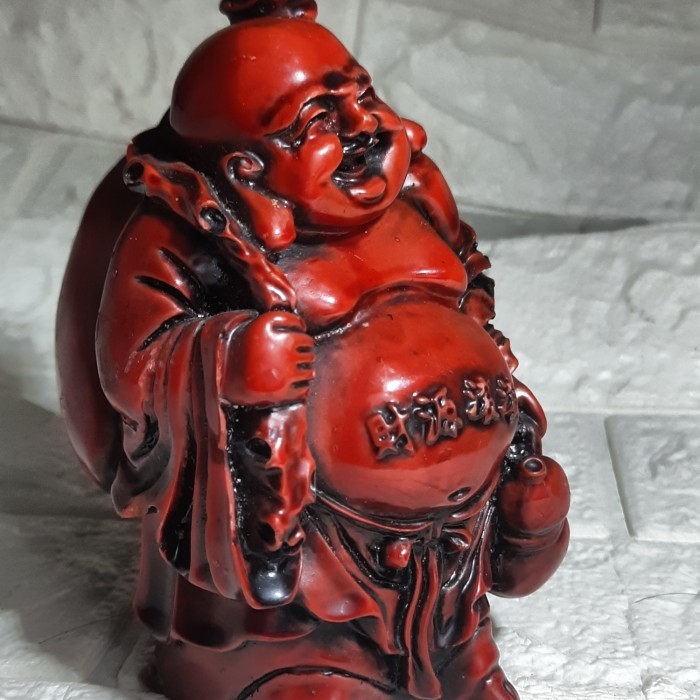 Sani - Patung Budha Ketawa