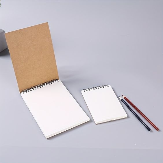 

BUKU SKETSA A7/SOUVENIR/HADIAH/SKETCHBOOK MINI/BRONW PAPER/BOOKPAPER/HVS/SKETSA