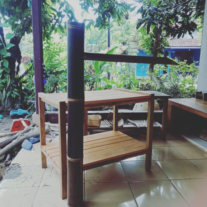 

pancuran air kolam bambu hitam