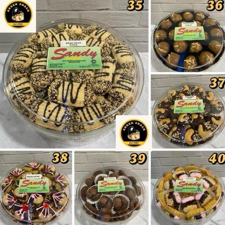 

SANDY COOKIES REGULAR (HIJAU) TOPLES TIN SEDANG (Exp PANJANG 2025) NASTAR / KASTENGEL / SAGU KEJU / LIDAH KUCING / PUTRI SALJU / SALJU MEDE / ALMOND CLASSIC / KEJU CRISPY / CHOCO CHEESE MEDE / BLUEBERRY RING / KUE JAKARTA IMLEK LEBARAN IDUL FITRI