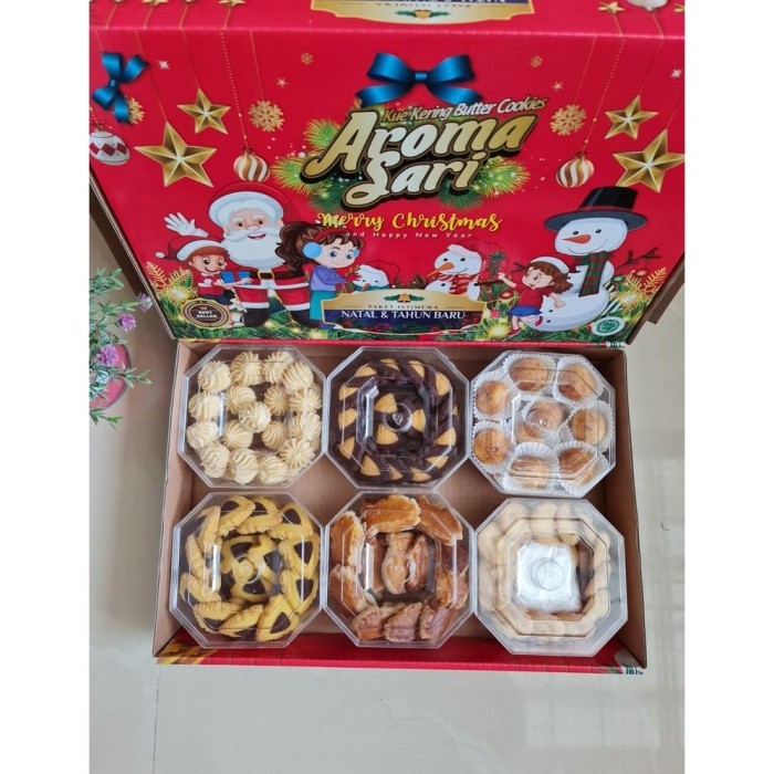 

PROMO!!!!!!!! KUE PAKET NATAL AROMA SARI ISI 6 TOPLES KUE KERING
