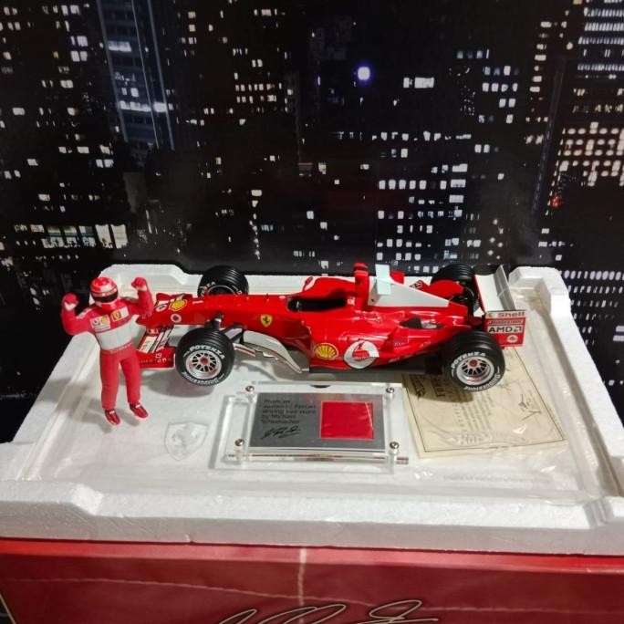 DIECAST F1 FERRARI F2004 MICHAEL SCHUMACHER 75 TH WINNER WITH CERTIFICATE SKALA 18 BY HOTWHEELS