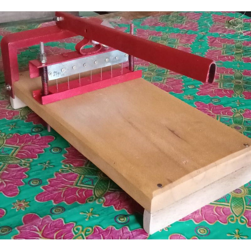 PANA alat pelubang plastik tempe