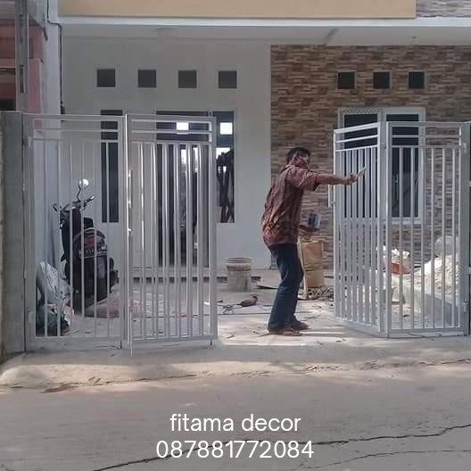 pintu pagar lipat besi hollo depok timur