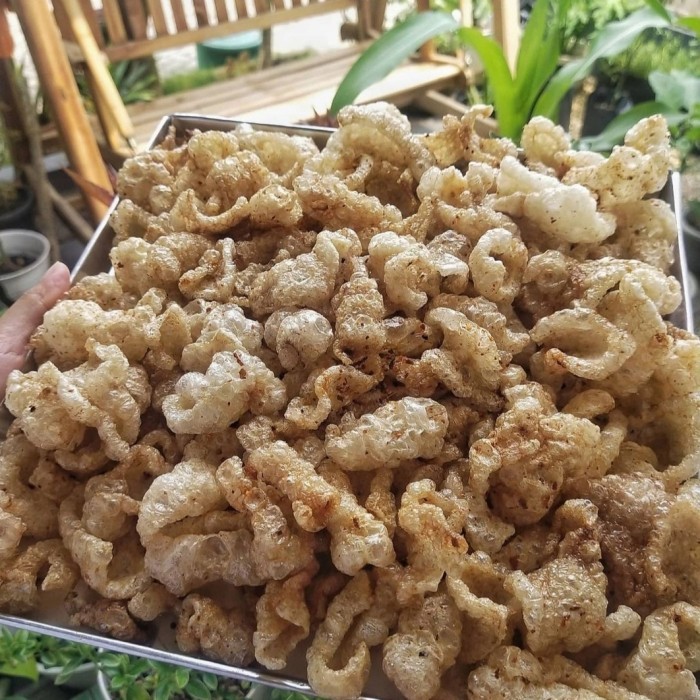 

TERBAIK KRUPUK KULIT BABI / RAMBAK BABI / PORK SKIN CRACKERS 125 GRAM / PACK