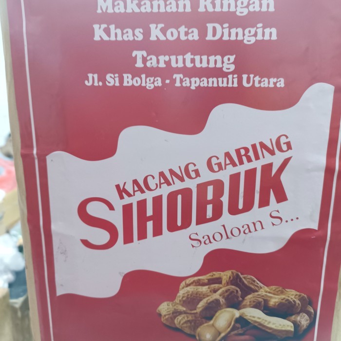 

Kacang Sihobuk 1 kaleng Kacang Garing Sihobuk