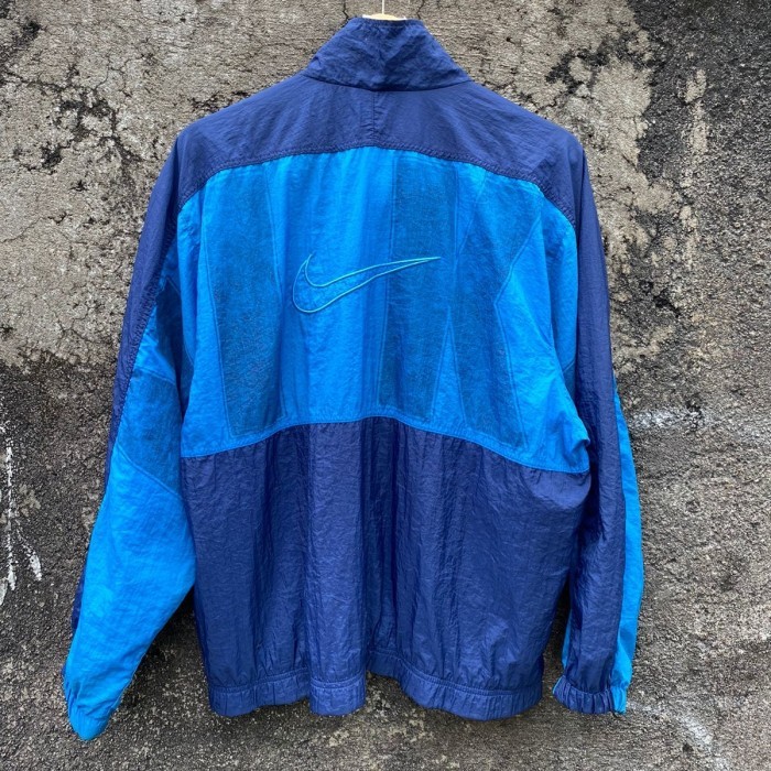 JAKET WINDBREAKER VINTAGE NIKE SPELLOUT WARNA BIRU SIZE XL