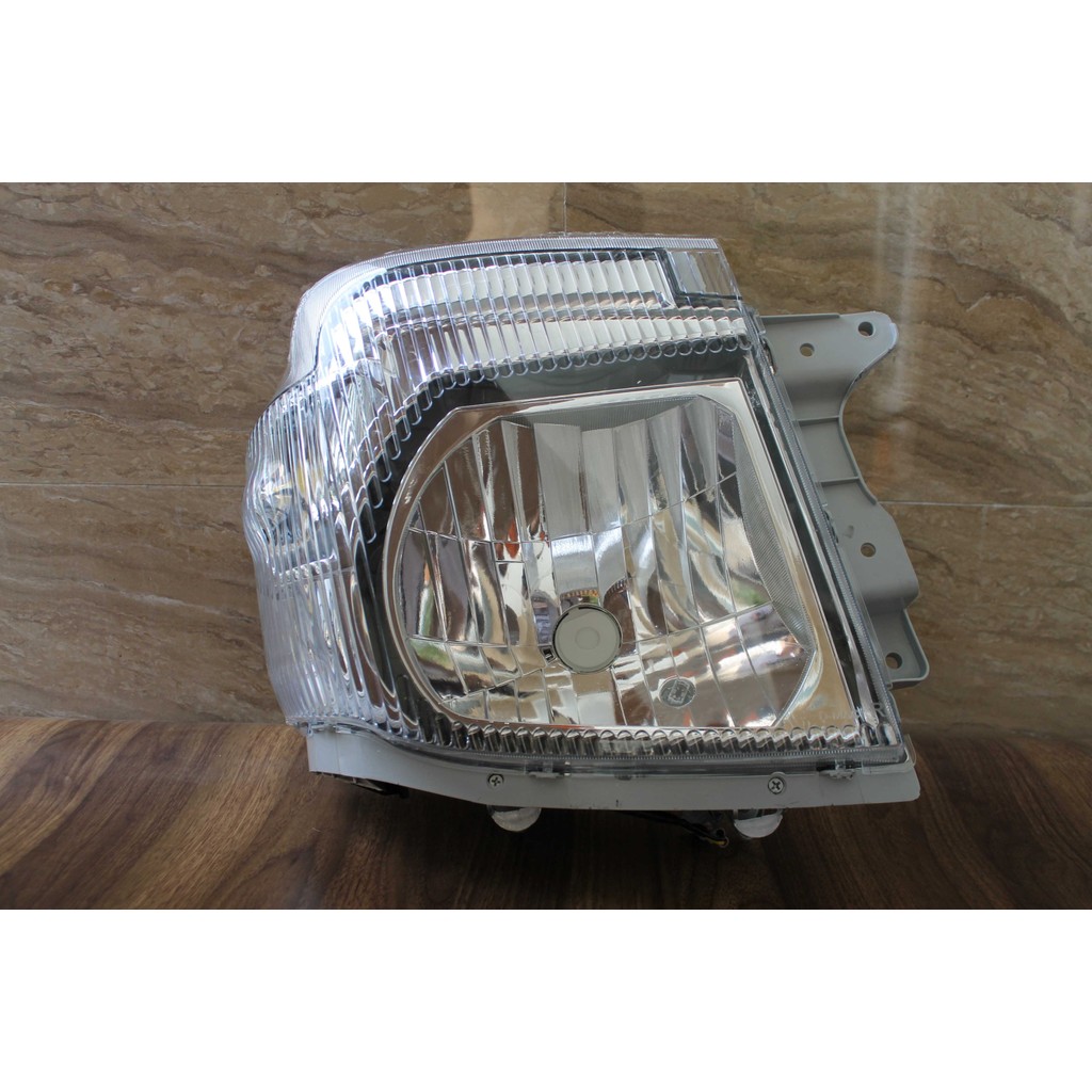 Lampu depan mobil / Head Lamp Assy ISUZU TRAGA tahun 2018 s/d 2023