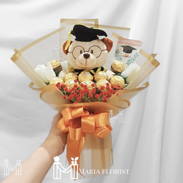 

BUKET WISUDA COKLAT FERRERO - BUKET BUNGA BONEKA KACAMATA WISUDA